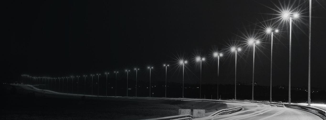 Black and White image of street road lighting